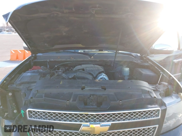 2010 Chevrolet Suburban LTZ with VIN 1GNUKKE3XAR142743, listed as a IAAI auction lot 41413380 with 236,384 mi miles. Bid and sale history available at carsss.com. Image 10.