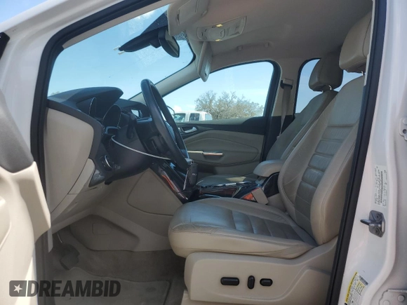 2016 Ford Escape Titanium with VIN 1FMCU0JX8GUC35838, listed as a Copart auction lot 51061285 with 84,224 mi miles and Salvage Title. Bid and sale history available at carsss.com. Image 7.