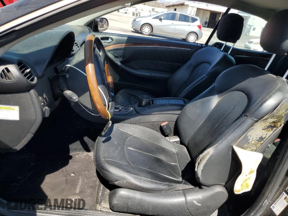 2006 Mercedes-Benz CLK-Class 5.0L with VIN WDBTK75G96T063299, listed as a Copart auction lot 69882884 with 148,934 mi miles and Salvage Title. Bid and sale history available at carsss.com. Image 7.