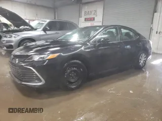 2021 Toyota Camry Hybrid LE with VIN 4T1C31AK3MU021767, listed as a Copart auction lot 89345345 with 51,755 mi miles and Salvage Title. Bid and sale history available at carsss.com. Image 1.