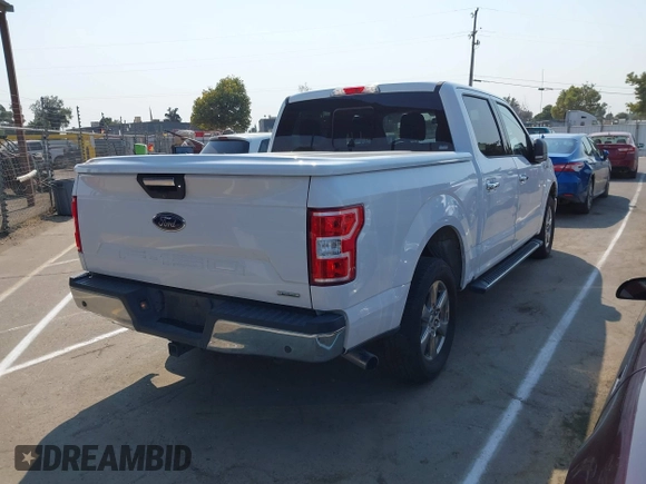 2019 Ford F-150 XL with VIN 1FTEW1C44KKC60773, listed as a IAAI auction lot 42706042 with 185,864 mi miles and . Bid and sale history available at DreamBid. Image 4.