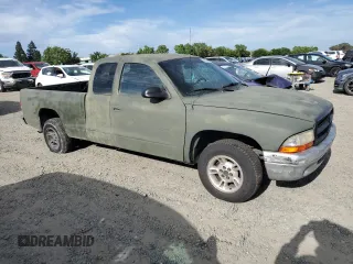 1999 Dodge Dakota SLT with VIN 1B7GL22X1XS228549, listed as a Copart auction lot 52900205 with 58,760 mi miles and Clean Title. Bid and sale history available at carsss.com. Image 4.