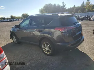 2016 Toyota RAV4 LE with VIN 2T3ZFREV3GW269727, listed as a Copart auction lot 74796814 with 235,242 mi miles and Salvage Title. Bid and sale history available at DreamBid. Image 2.
