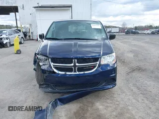 2016 Dodge Grand Caravan SE with VIN 2C4RDGBG4GR146450, listed as a IAAI auction lot 42015145 with 128,725 mi miles. Bid and sale history available at carsss.com. Image 12.