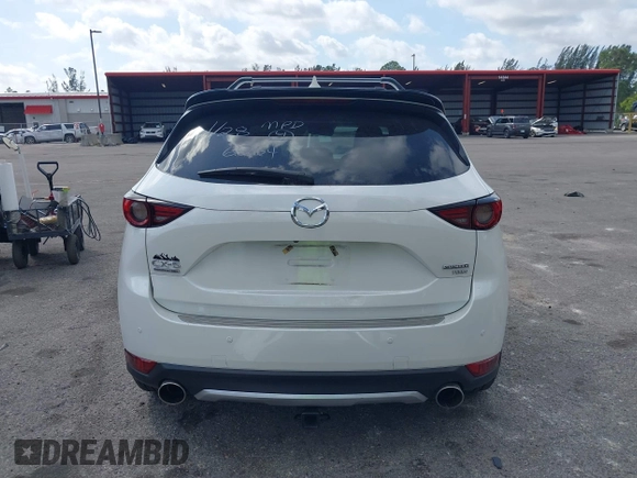 2021 Mazda CX-5 Signature with VIN JM3KFBEY0M0436264, listed as a IAAI auction lot 41568892 with 36,833 mi miles. Bid and sale history available at carsss.com. Image 16.