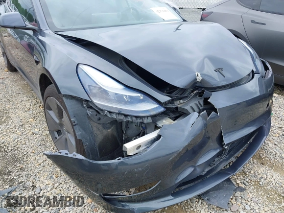 2023 Tesla Model 3 with VIN 5YJ3E1EA0PF473754, listed as a IAAI auction lot 42351494 with Not provided miles and . Bid and sale history available at DreamBid. Image 6.