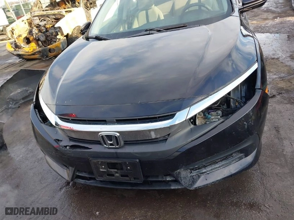 2018 Honda Civic Sedan LX with VIN 19XFC2F54JE209640, listed as a IAAI auction lot 41325243 with 106,191 mi miles. Bid and sale history available at carsss.com. Image 18.