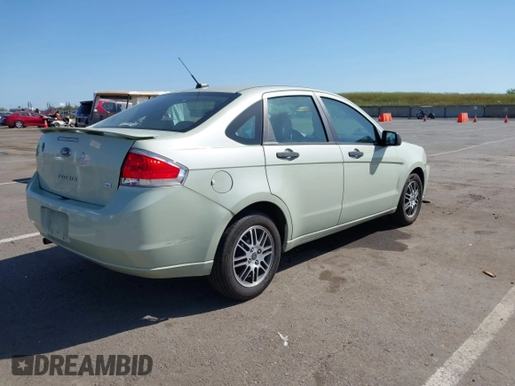 2011 Ford Focus SE with VIN 1FAHP3FN9BW167286, listed as a IAAI auction lot 42087263 with 71,923 mi miles. Bid and sale history available at carsss.com. Image 4.