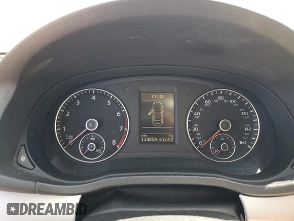 2012 Volkswagen Passat SE z VIN 1VWBH7A39CC050611, wystawiony jako Copart lot #51877065 z przebiegiem 134 059 mil mil oraz Szkoda całkowita • Salvage title. Historia ofert i sprzedaży dostępna na DreamBid. Obrazek 9.