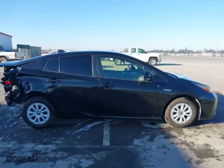 2019 Toyota Prius L Eco with VIN JTDKARFU9K3090948, listed as a IAAI auction lot 41400008 with 113,323 mi miles. Bid and sale history available at carsss.com. Image 13.