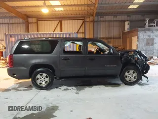 2010 Chevrolet Suburban LS with VIN 1GNUCHE01AR158111, listed as a IAAI auction lot 41602157 with 263,227 mi miles. Bid and sale history available at carsss.com. Image 14.