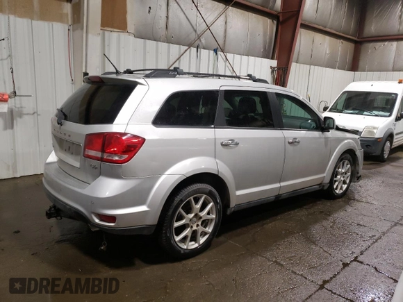 2013 Dodge Journey R/T with VIN 3C4PDDFG8DT621087, listed as a Copart auction lot 83105834 with 156,172 mi miles and Salvage title. Bid and sale history available at DreamBid. Image 3.