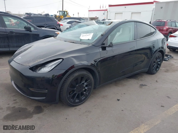 2021 Tesla Model Y Long Range with VIN 5YJYGDEE5MF060955, listed as a IAAI auction lot 41553893 with 85,208 mi miles. Bid and sale history available at carsss.com. Image 18.