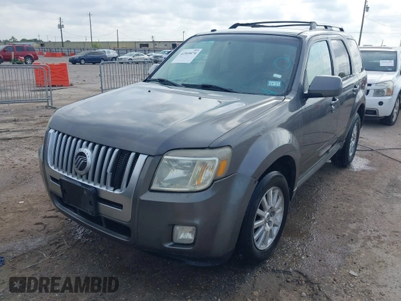 2011 Mercury Mariner Premier with VIN 4M2CN8HG3BKJ07656, listed as a IAAI auction lot 42369474 with 250,352 mi miles and . Bid and sale history available at DreamBid. Image 2.