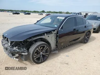 2021 BMW 3 Series 330i with VIN 3MW5R1J01M8B98838, listed as a Copart auction lot 56878795 with 62,607 mi miles and Salvage title. Bid and sale history available at DreamBid. Image 1.