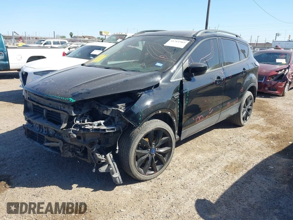 2018 Ford Escape SE z VIN 1FMCU9GD3JUC75754, wystawiony jako IAAI lot #41761965 z przebiegiem 101 771 mil mil oraz . Historia ofert i sprzedaży dostępna na DreamBid. Obrazek 17.