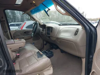 2001 Ford F-150 SuperCrew XLT with VIN 1FTRW08L61KF76055, listed as a IAAI auction lot 42027968 with 301,095 mi miles. Bid and sale history available at carsss.com. Image 5.
