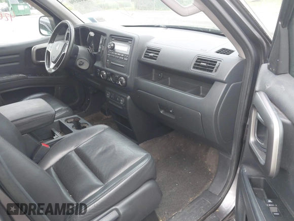 2014 Honda Ridgeline RTL with VIN 5FPYK1F5XEB011772, listed as a IAAI auction lot 42440390 with 145,219 mi miles and . Bid and sale history available at DreamBid. Image 5.