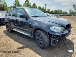 2012 BMW X5 35i with VIN 5UXZV4C5XCL765757, listed as a Copart auction lot 64497535 with 178,836 mi miles and Salvage title. Bid and sale history available at DreamBid. Image 4.