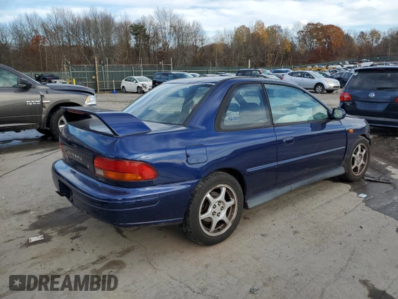 2000 Subaru Impreza RS with VIN JF1GM6750YG400589, listed as a Copart auction lot 78799154 with Not provided miles and Salvage title. Bid and sale history available at DreamBid. Image 3.