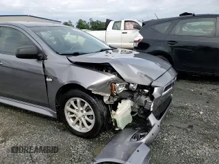 2014 Mitsubishi Lancer ES with VIN JA32U2FUXEU003358, listed as a Copart auction lot 55555935 with 185,151 mi miles and Salvage title. Bid and sale history available at DreamBid. Image 13.