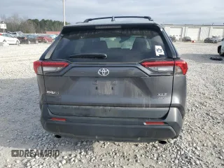 2020 Toyota RAV4 XLE with VIN 2T3P1RFV2LW106551, listed as a Copart auction lot 48983705 with 76,306 mi miles and Salvage Title. Bid and sale history available at DreamBid. Image 6.
