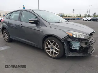 2015 Ford Focus SE with VIN 1FADP3K27FL387012, listed as a IAAI auction lot 42100945 with 85,588 mi miles. Bid and sale history available at carsss.com. Image 1.