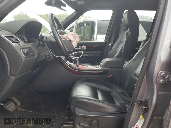 2013 Land Rover Range Rover Sport HSE z VIN SALSF2D40DA799657, wystawiony jako Copart lot #56318965 z przebiegiem 132 182 mil mil oraz Szkoda całkowita • Salvage title. Historia ofert i sprzedaży dostępna na DreamBid. Obrazek 7.