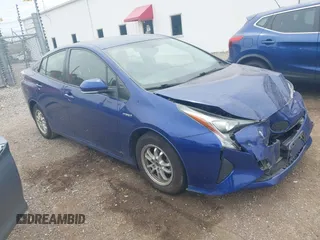 2016 Toyota Prius Two z VIN JTDKBRFU3G3511809, wystawiony jako IAAI lot #42295946 z przebiegiem 118 621 mil mil oraz . Historia ofert i sprzedaży dostępna na DreamBid. Obrazek 1.