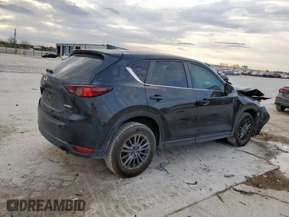 2021 Mazda CX-5 Sport with VIN JM3KFABM7M0325089, listed as a Copart auction lot 50479415 with 137,705 mi miles and Salvage Title. Bid and sale history available at carsss.com. Image 3.