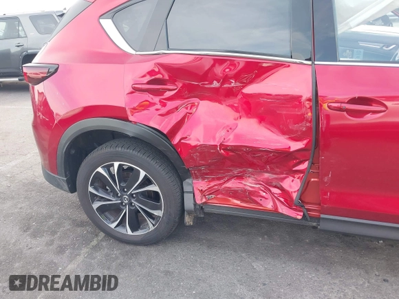 2023 Mazda CX-5 S Premium with VIN JM3KFBDM2P0130525, listed as a IAAI auction lot 41479518 with 18,145 mi miles and . Bid and sale history available at DreamBid. Image 6.
