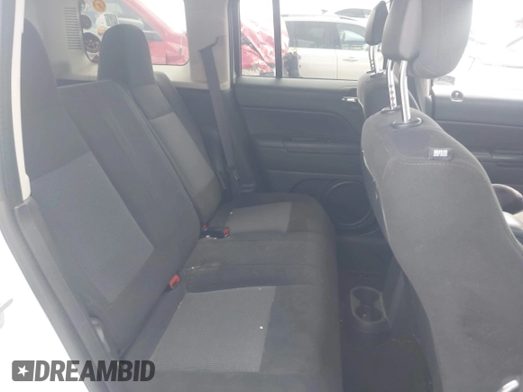 2016 Jeep Patriot Latitude with VIN 1C4NJPFB3GD583834, listed as a IAAI auction lot 42648455 with 118,083 mi miles and . Bid and sale history available at DreamBid. Image 8.