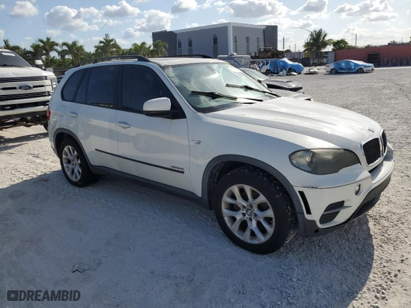 2011 BMW X5 35i with VIN 5UXZV4C55BL407979, listed as a Copart auction lot 53757955 with 165,895 mi miles and Clean Title. Bid and sale history available at carsss.com. Image 4.