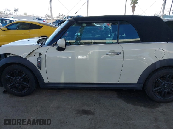 2014 MINI Convertible S with VIN WMWZP3C5XET706911, listed as a IAAI auction lot 42217410 with 54,649 mi miles and . Bid and sale history available at DreamBid. Image 14.