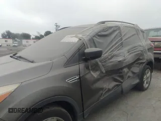 2014 Ford Escape SE with VIN 1FMCU0GXXEUA77765, listed as a IAAI auction lot 40158558 with 88,373 mi miles. Bid and sale history available at carsss.com. Image 6.