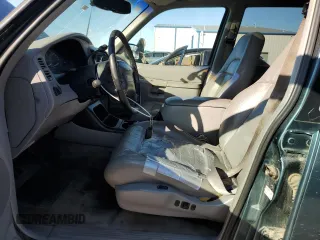 1997 Ford Explorer XL with VIN 1FMDU34E2VZC03015, listed as a Copart auction lot 80654764 with 295,587 mi miles and Salvage title. Bid and sale history available at DreamBid. Image 7.