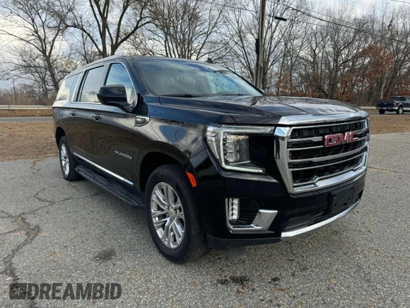 2021 GMC Yukon XL SLT with VIN 1GKS2GKDXMR238116, listed as a Copart auction lot 87132704 with 106,975 mi miles and Clean Title. Bid and sale history available at carsss.com. Image 1.
