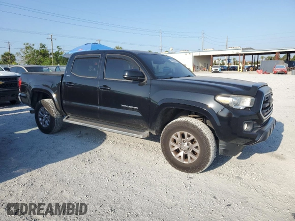 2018 Toyota Tacoma SR5 with VIN 3TMAZ5CN0JM064214, listed as a Copart auction lot 54200645 with 112,336 mi miles and Salvage Title. Bid and sale history available at DreamBid. Image 4.