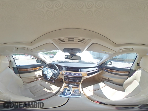 2014 BMW 7 Series 740i z VIN WBAYA6C51ED144132, wystawiony jako Copart lot #55131365 z przebiegiem 116 826 mil mil oraz Szkoda całkowita • Salvage title. Historia ofert i sprzedaży dostępna na DreamBid. Obrazek 14.