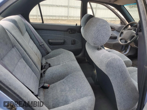 1995 Toyota Corolla DX with VIN 2T1AE09B5SC127586, listed as a Copart auction lot 57075045 with 244,969 mi miles and Salvage title. Bid and sale history available at DreamBid. Image 10.