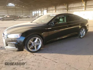 2018 Audi A5 Sportback Premium with VIN WAUDNCF52JA004082, listed as a Copart auction lot 87002474 with 84,790 mi miles and Salvage Title. Bid and sale history available at carsss.com. Image 1.