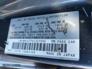 2016 Mazda Mazda3 i Sport with VIN JM1BM1U77G1327090, listed as a IAAI auction lot 41039358 with 94,107 mi miles. Bid and sale history available at carsss.com. Image 9.
