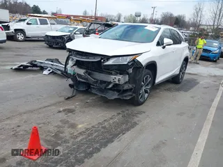 2017 Lexus RX with VIN 2T2BGMCA1HC018939, listed as a IAAI auction lot 41788675 with 104,305 mi miles. Bid and sale history available at carsss.com. Image 2.