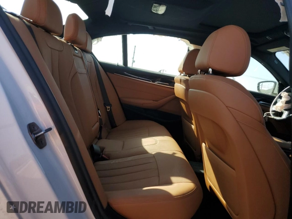 2023 BMW 5 Series 530e with VIN WBA13AG02PCL73814, listed as a Copart auction lot 86818824 with Not provided miles and Salvage title. Bid and sale history available at DreamBid. Image 11.