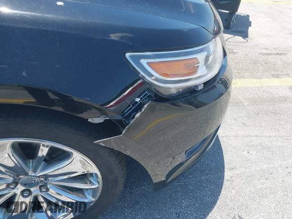 2010 Ford Taurus Limited with VIN 1FAHP2FW4AG151640, listed as a IAAI auction lot 42049305 with 135,769 mi miles. Bid and sale history available at carsss.com. Image 6.