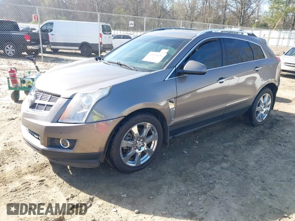 2012 Cadillac SRX Performance Collection with VIN 3GYFNBE3XCS565616, listed as a IAAI auction lot 41835476 with 141,259 mi miles. Bid and sale history available at carsss.com. Image 18.