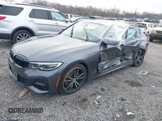 2019 BMW 3 Series 330i xDrive with VIN WBA5R7C54KFH24284, listed as a IAAI auction lot 41246406 with 57,200 mi miles. Bid and sale history available at carsss.com. Image 2.