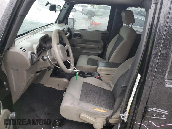 2009 Jeep Wrangler Unlimited X with VIN 1J4GA39119L755818, listed as a Copart auction lot 47886245 with 187,972 mi miles and Salvage Title. Bid and sale history available at carsss.com. Image 7.