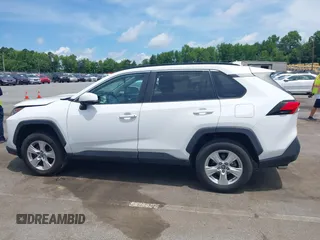 2019 Toyota RAV4 XLE with VIN 2T3P1RFV0KC008652, listed as a IAAI auction lot 42508557 with 87,684 mi miles and . Bid and sale history available at DreamBid. Image 14.