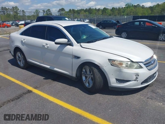 2014 Ford Taurus SEL with VIN 1FAHP2E86EG132676, listed as a IAAI auction lot 41943392 with 183,633 mi miles. Bid and sale history available at carsss.com. Image 1.